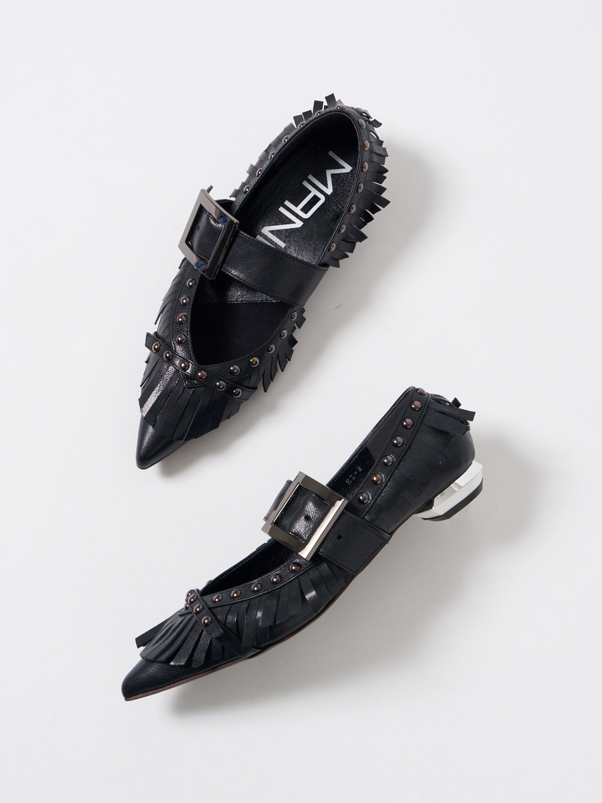 551193 Fringe and studded pumps