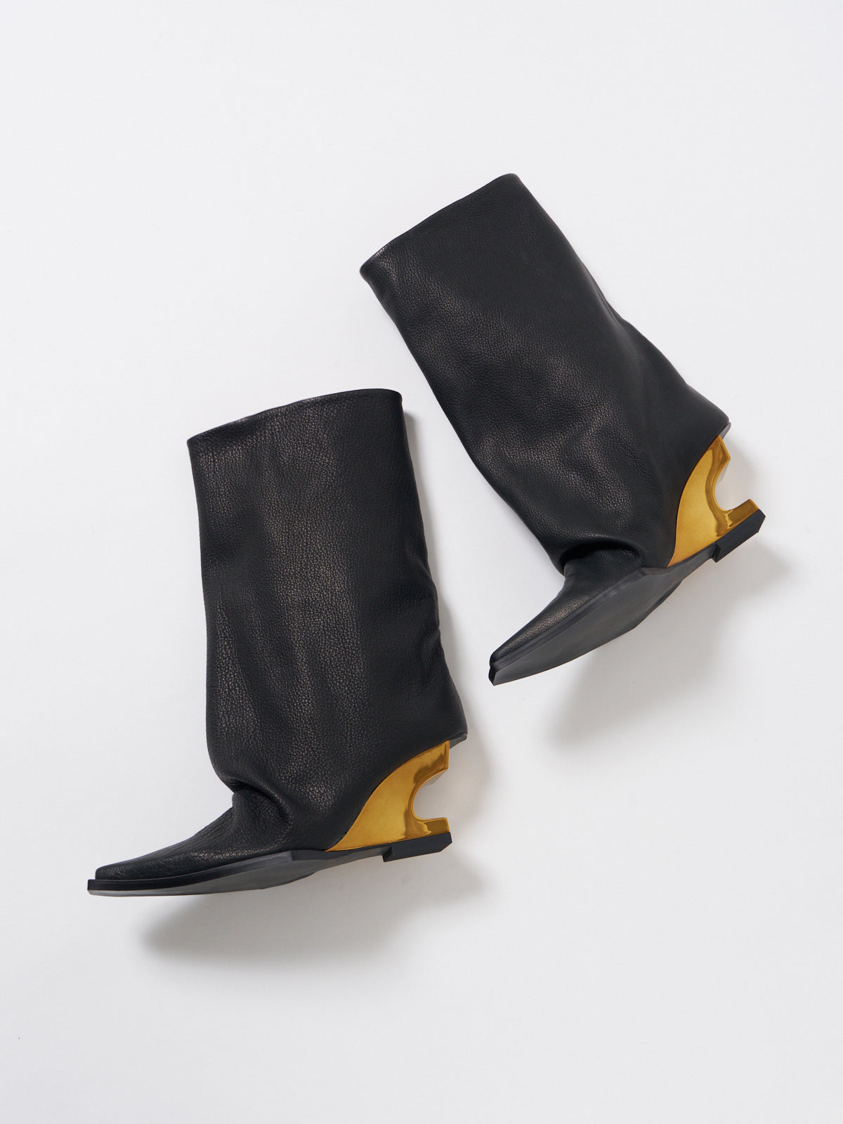 558034 Loose silhouette half boots