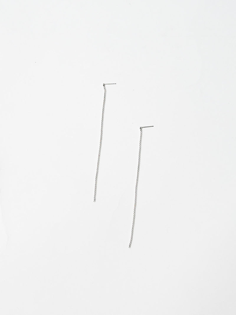 550285 Skin long earrings